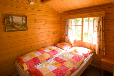 Hutten - Vakantiewoningen - Vakantiehuizen en Camping in Geiranger, Noorwegen | 26m2 met uitzicht over het dal en de Fjorden.