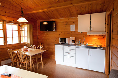 Hutten - Vakantiewoningen - Vakantiehuizen en Camping in Geiranger, Noorwegen | 34m2 met uitzicht over het dal en de Fjorden.